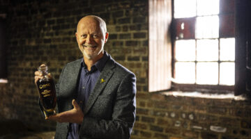 Graham Eunson Master Distiller with the Trophy in WH6 (3).jpg